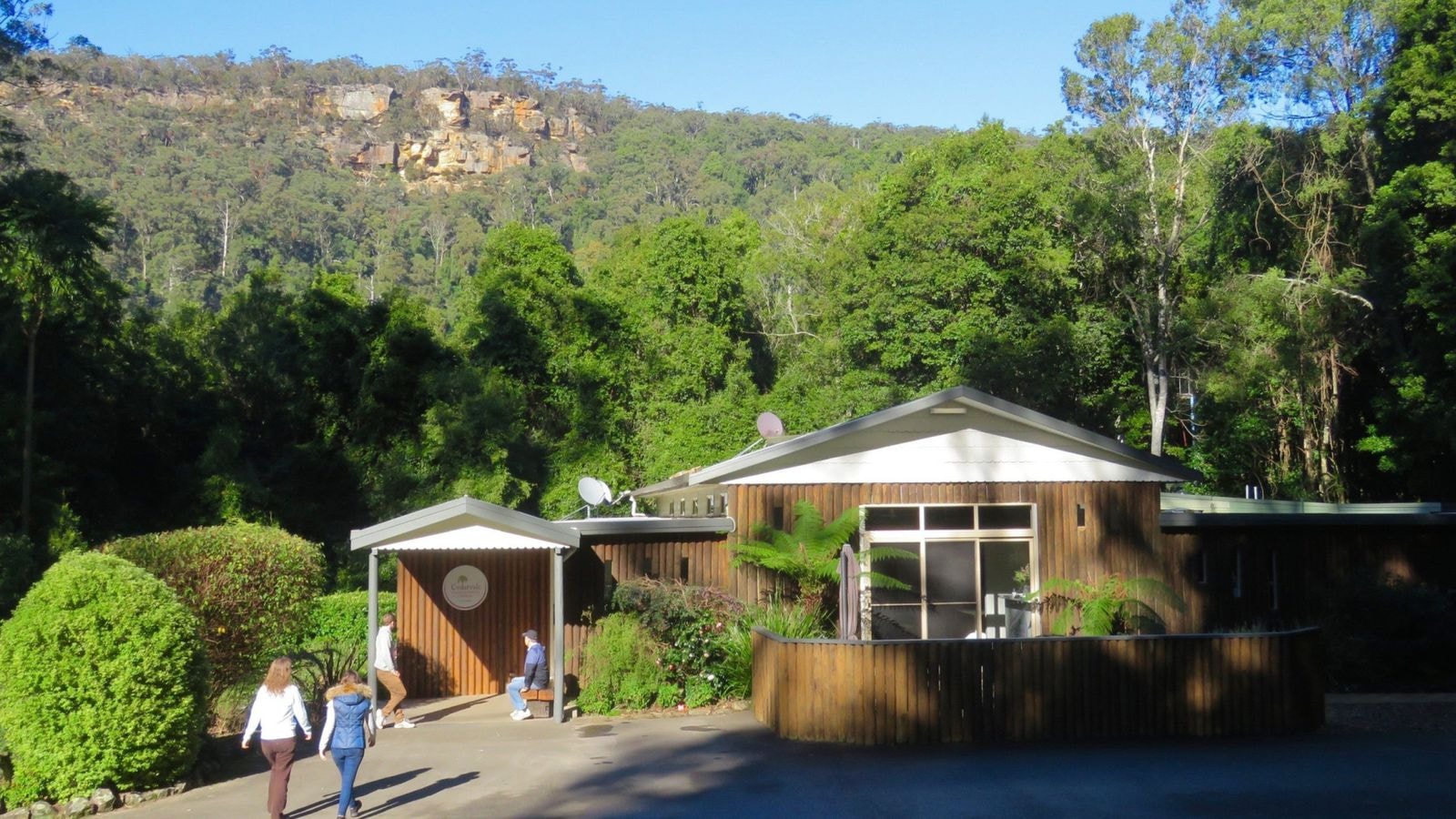 The Cedarvale NSW retreat entrance beneath the Kangaroo Valley escarpment